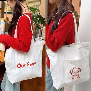 重工刺绣潦草小狗单肩包大容量帆布包女秋冬安可拉红色布袋上课包