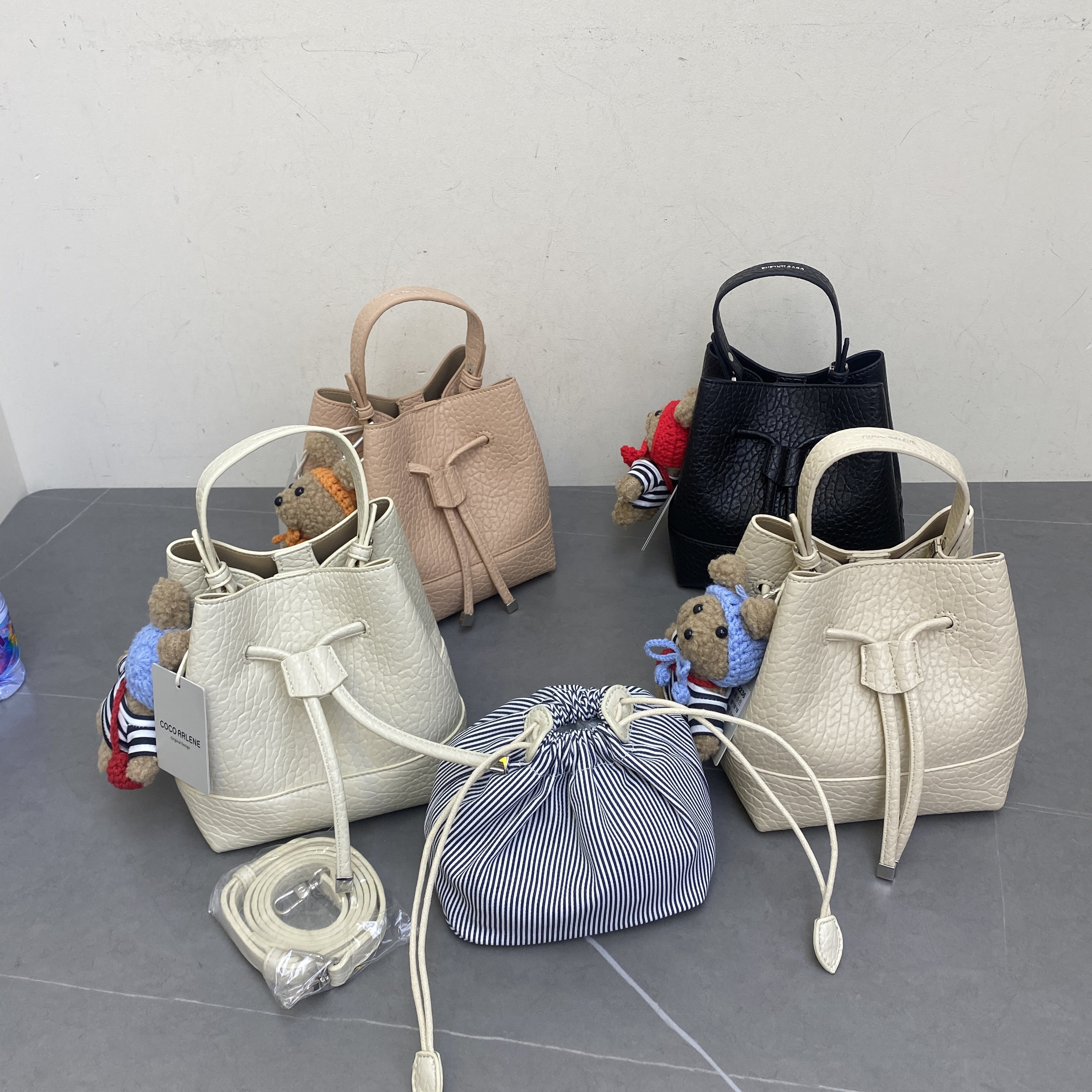 2026春新款女包时尚百搭手提单肩斜挎包抽绳包腋下包水桶包托特包