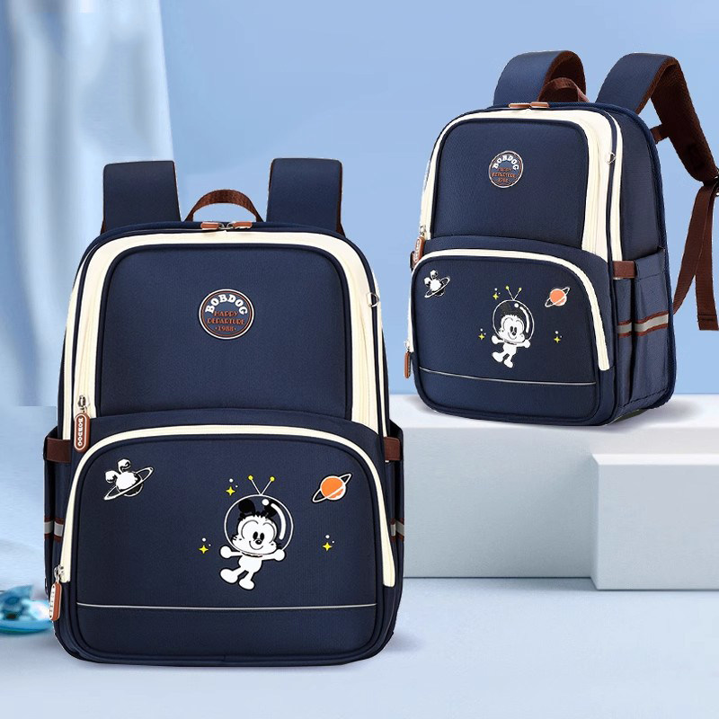 英国netx Kiss小学生书包超轻减负男童女孩一二三年级护脊双肩包