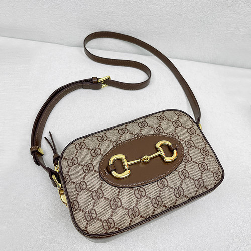 休闲百搭印花真皮单肩斜挎包