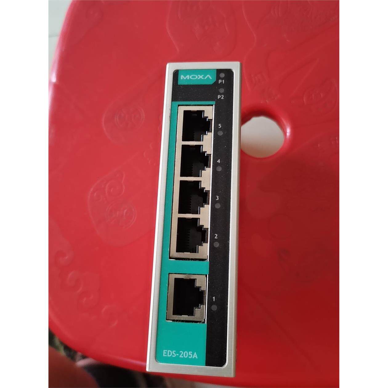 moxa工业级以太网交换机eds-205a，拆机1台，实物拍