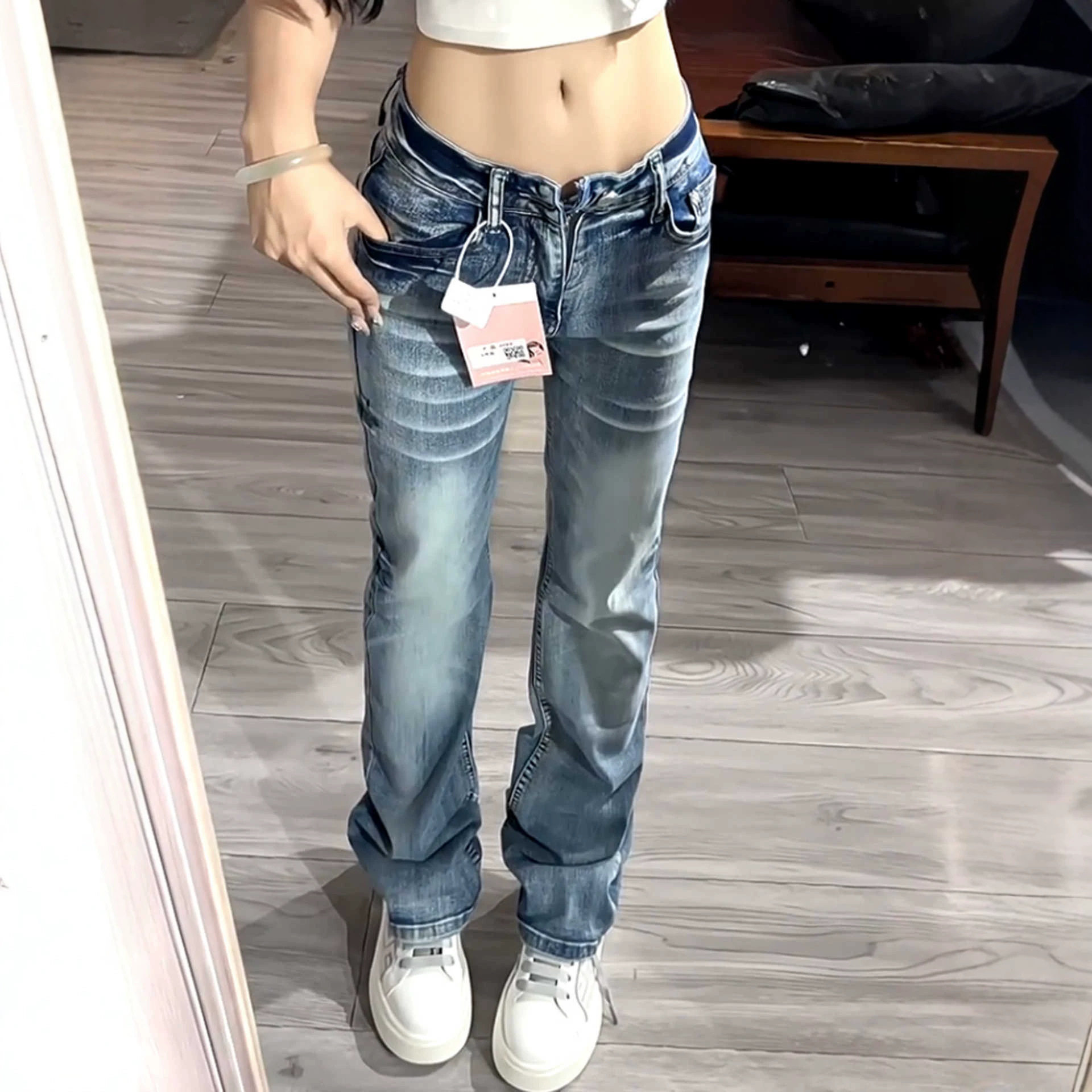 美式高街毛须低腰微喇牛仔裤女春秋2026设计感弹力窄版直筒裤秋季