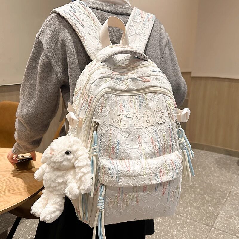 日本高颜值书包女初中生简约大容量小学生双肩包大学生设计感背包