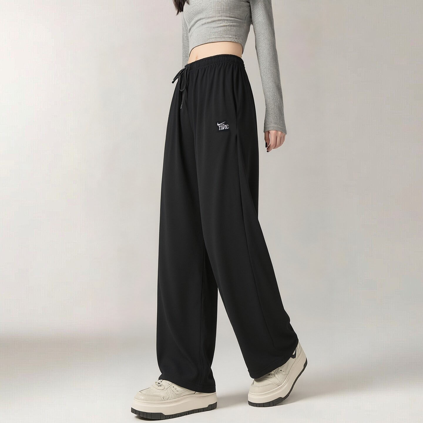 Nike耐克裤子宽松大码女裤针织运动裤新款透气直筒长裤黑色休闲裤