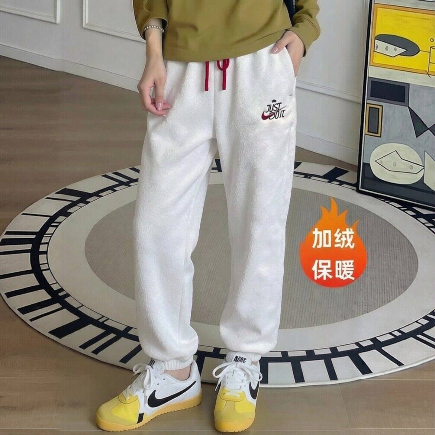 Nike耐克裤子加绒保暖束脚卫裤女子摇粒绒运动裤冬季新款休闲长裤