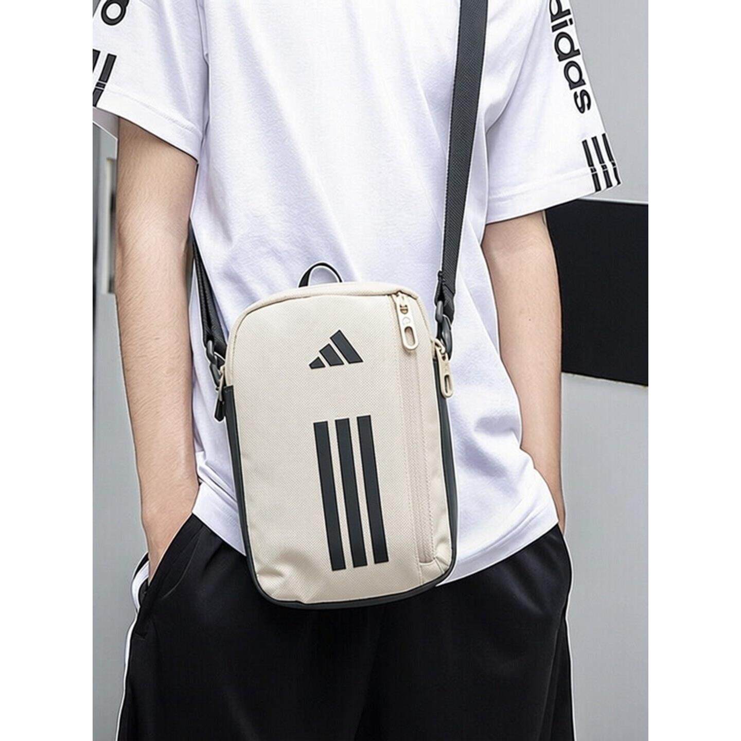 adidas运动斜挎包男女小包正品户外休闲旅行通勤男士卡其色单肩包
