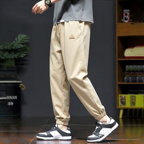 Adidas卡其色长裤防晒拒水防泼梭织弹力运动裤户外休闲束脚长裤