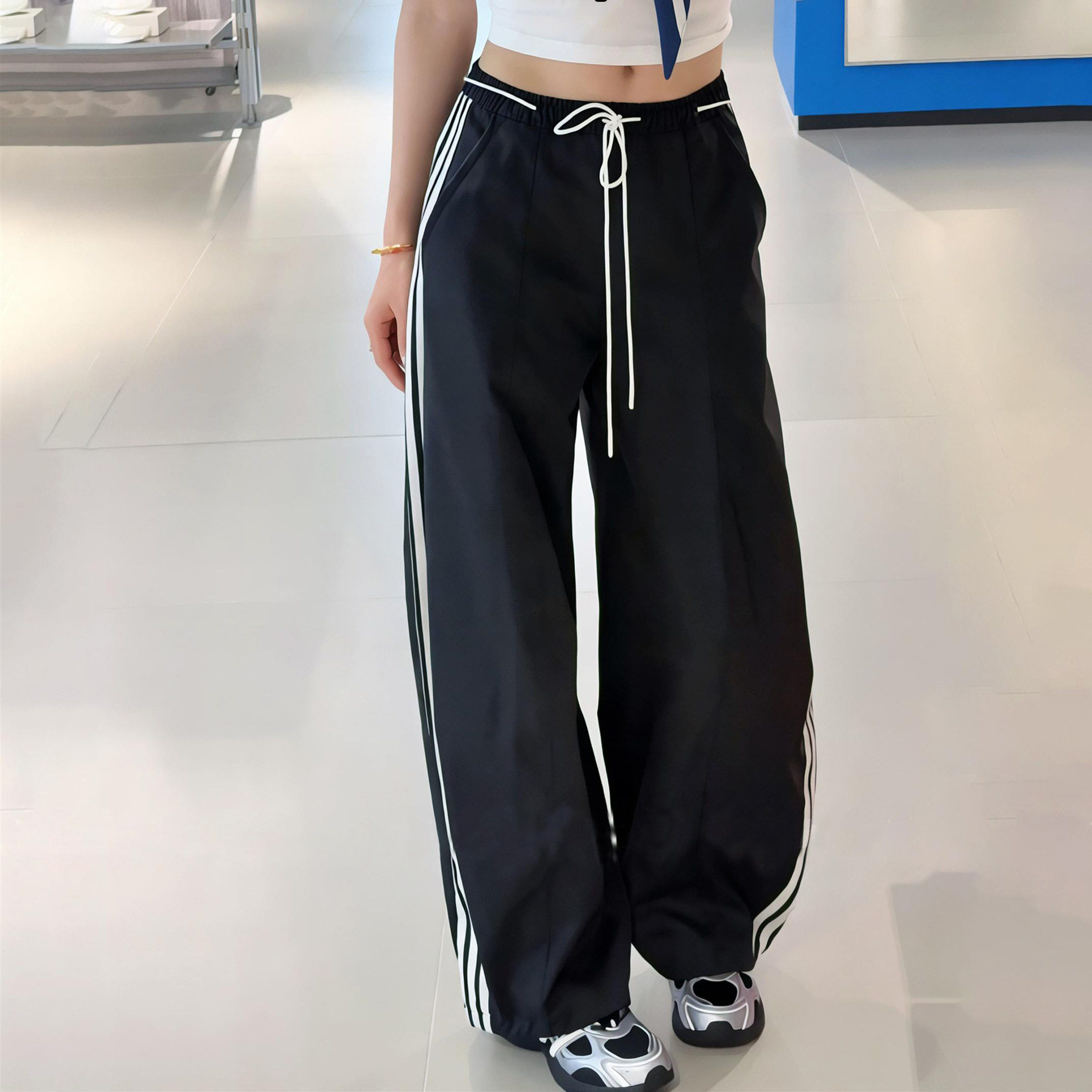 阿迪达斯裤子女新款透气宽松美式梭织复古三条纹直筒弯刀香蕉裤女