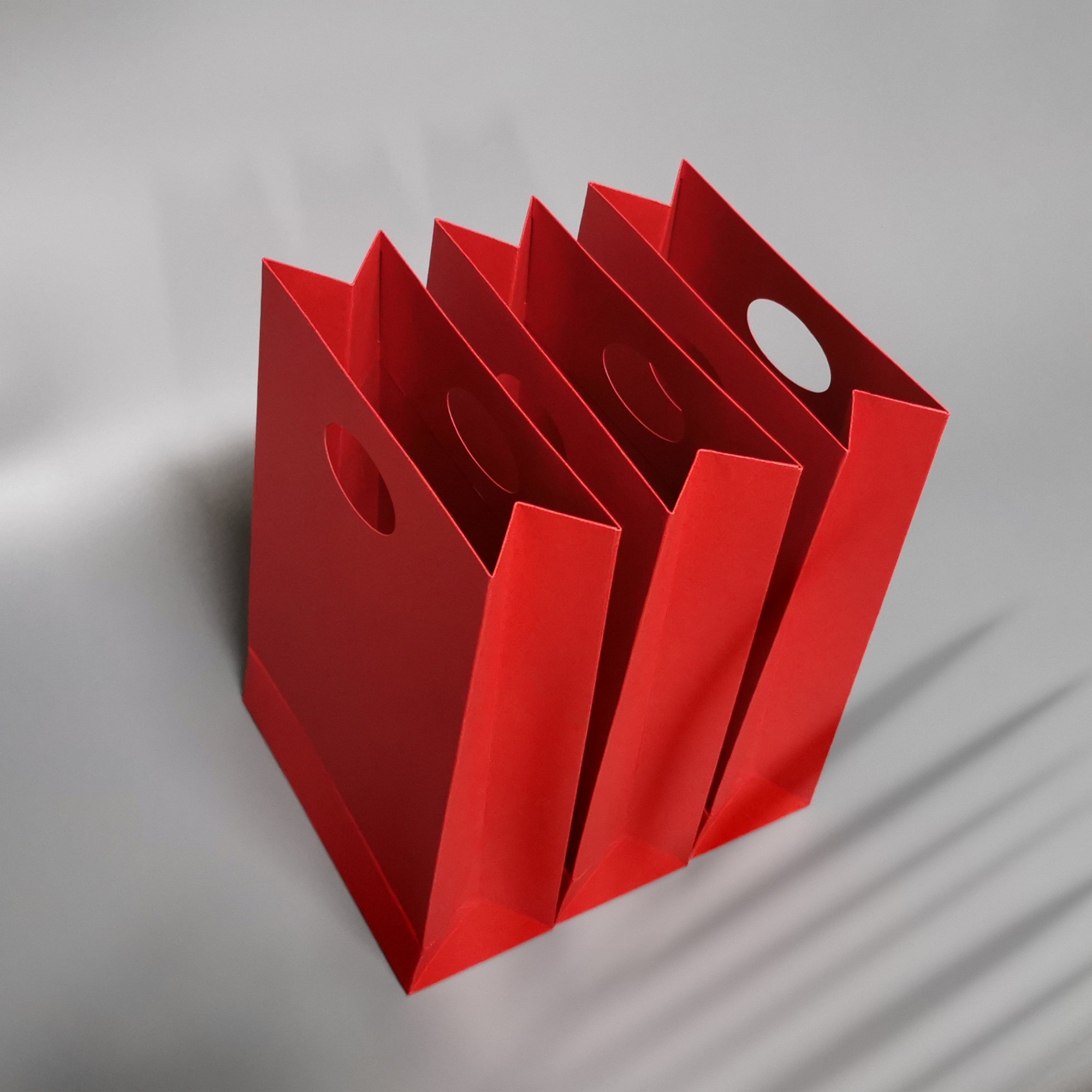 个性提孔手提袋订制logo高级灰纸袋喜庆红色无字开业活动礼物袋子