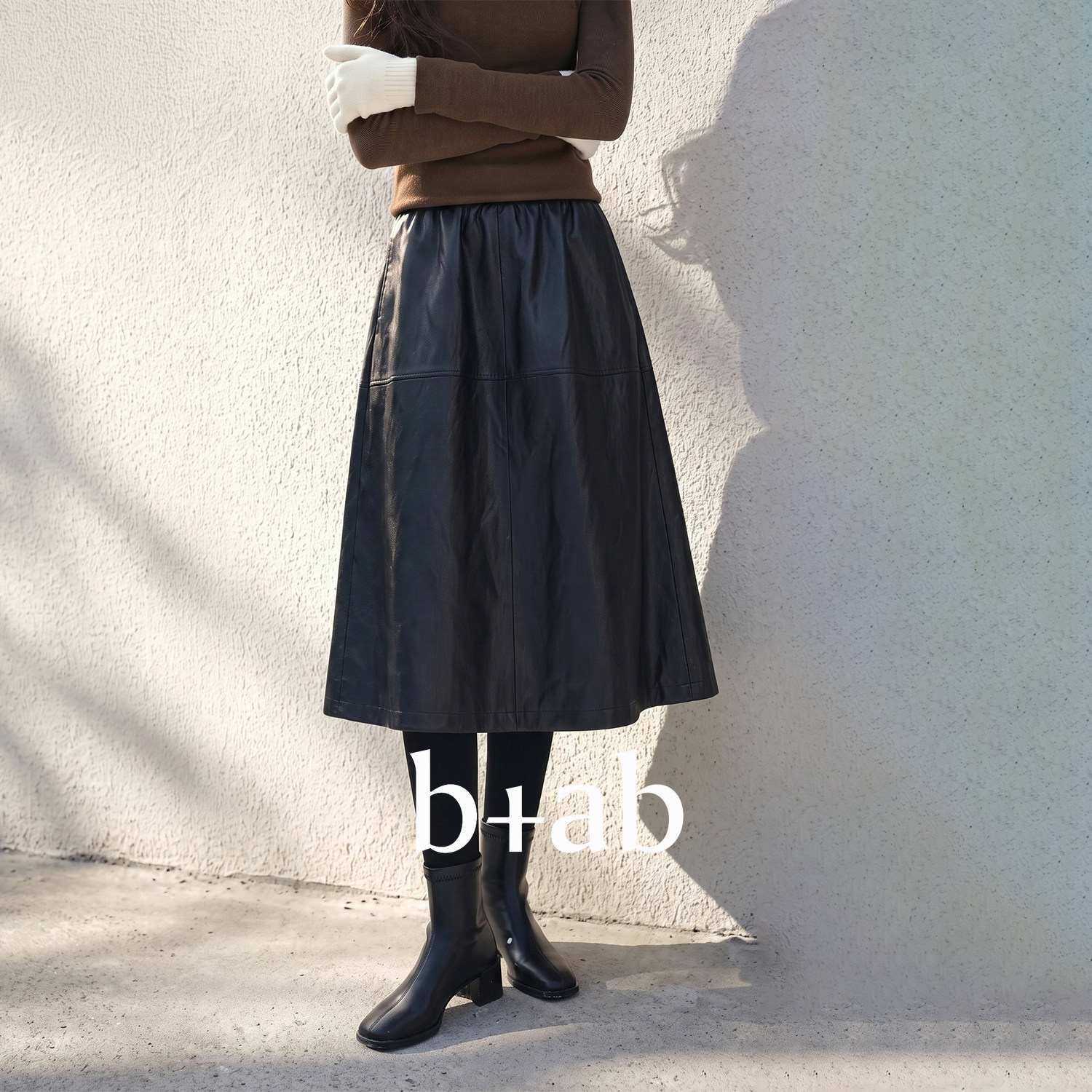 it b+ab 2026秋季新款黑色半身裙女松紧腰中长款A字时髦百搭皮裙