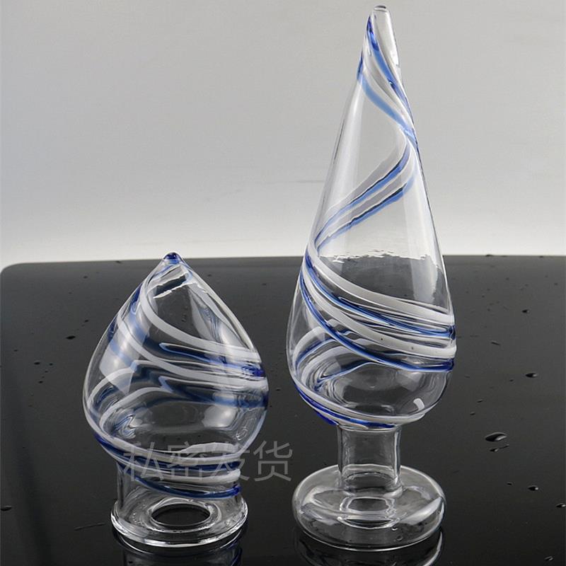 A self-pleasuring toy made of glass for use inside the anus.