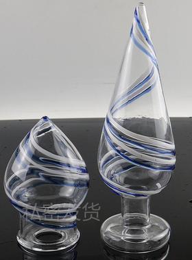 A self-pleasuring toy made of glass for use inside the anus.