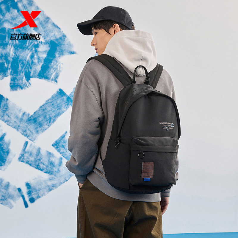 特步运动双肩包男女2025春秋新款百搭休闲情侣背包学生通勤电脑包