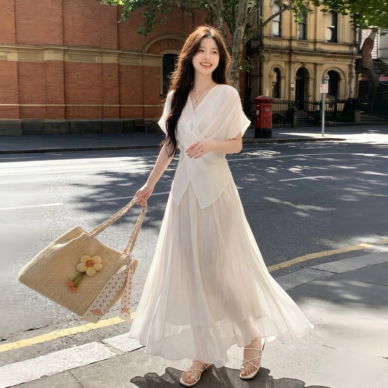 绝美新款温柔风气质套装女2026款设计感收腰上衣网纱半身裙两件套