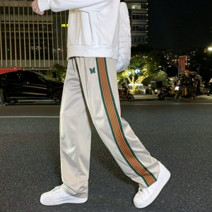 21新款潮牌男士条纹织带刺绣蝴蝶休闲直通长裤b288-c图片