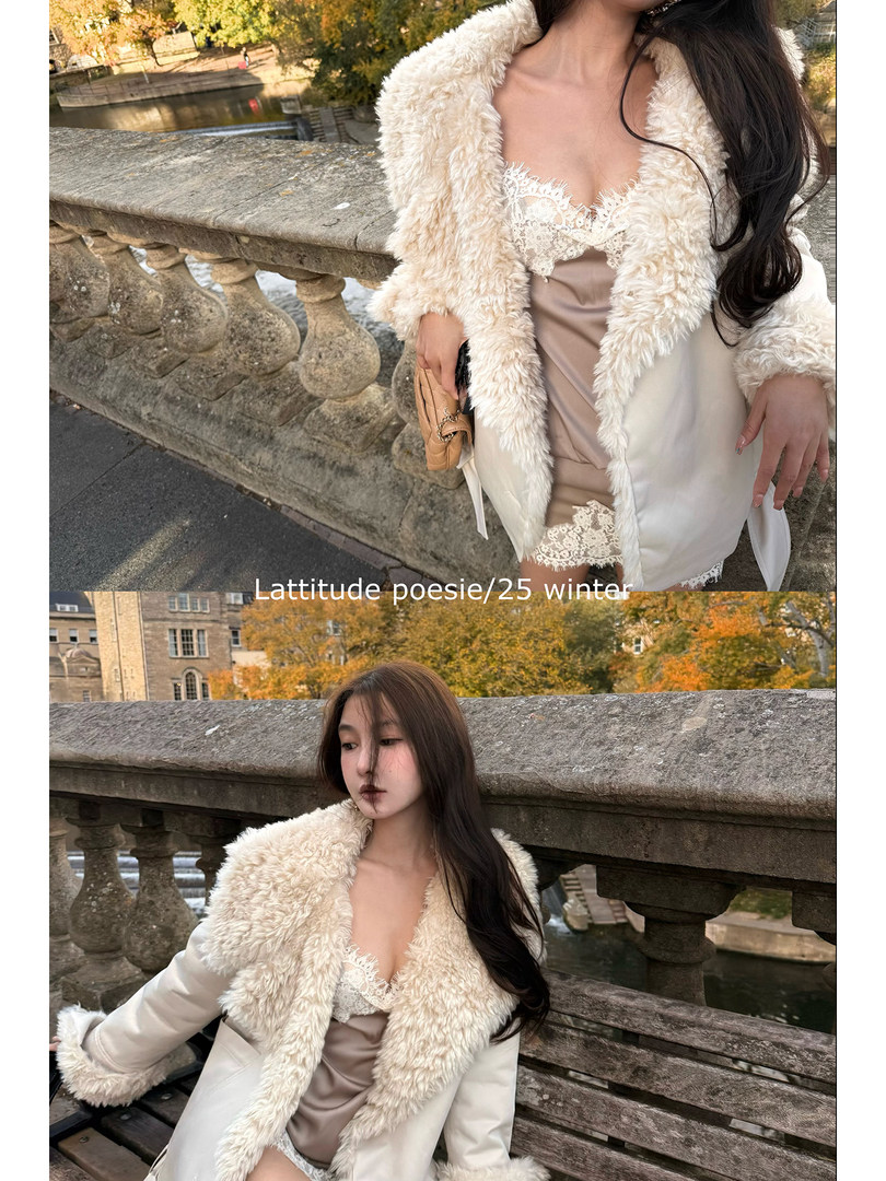 Cream faux fur trimmed winter coat worn by a model outdoors