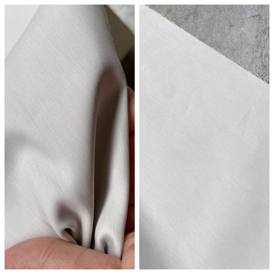 棉涤服饰杏仁白防水进口布料