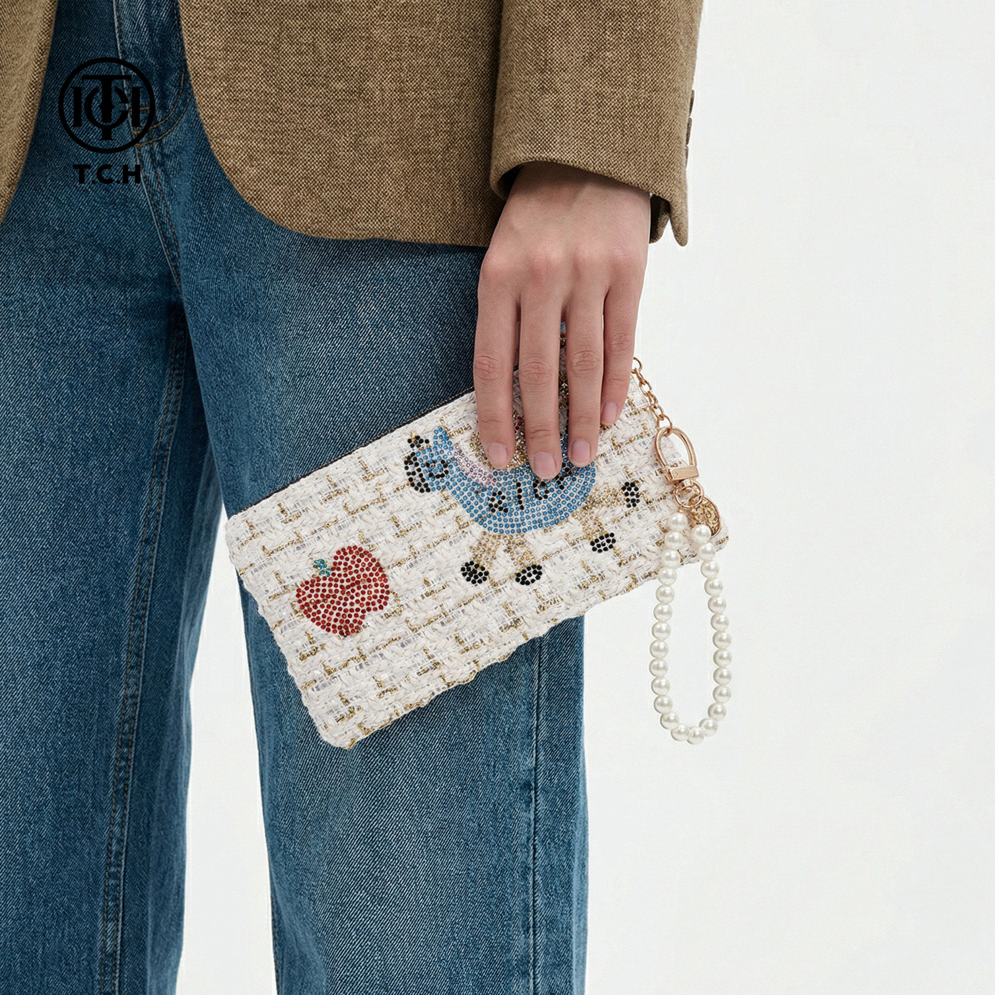 TCH烫钻小马手拿包女2026新款珍珠链粗花呢白色手提包T78A40E5016