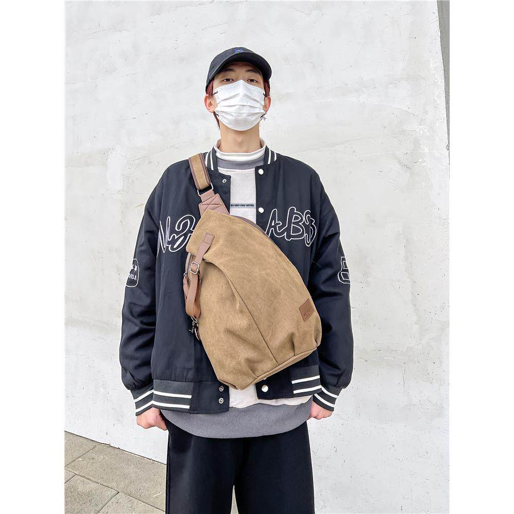 日系帆布包潮牌胸包男新款户外运动斜挎包机车背包复古单肩包学生