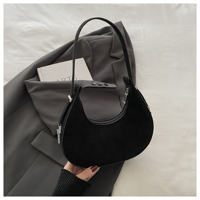 月牙腋下包包女2024高级感手提包春夏质感单肩小众设计法棍月亮包