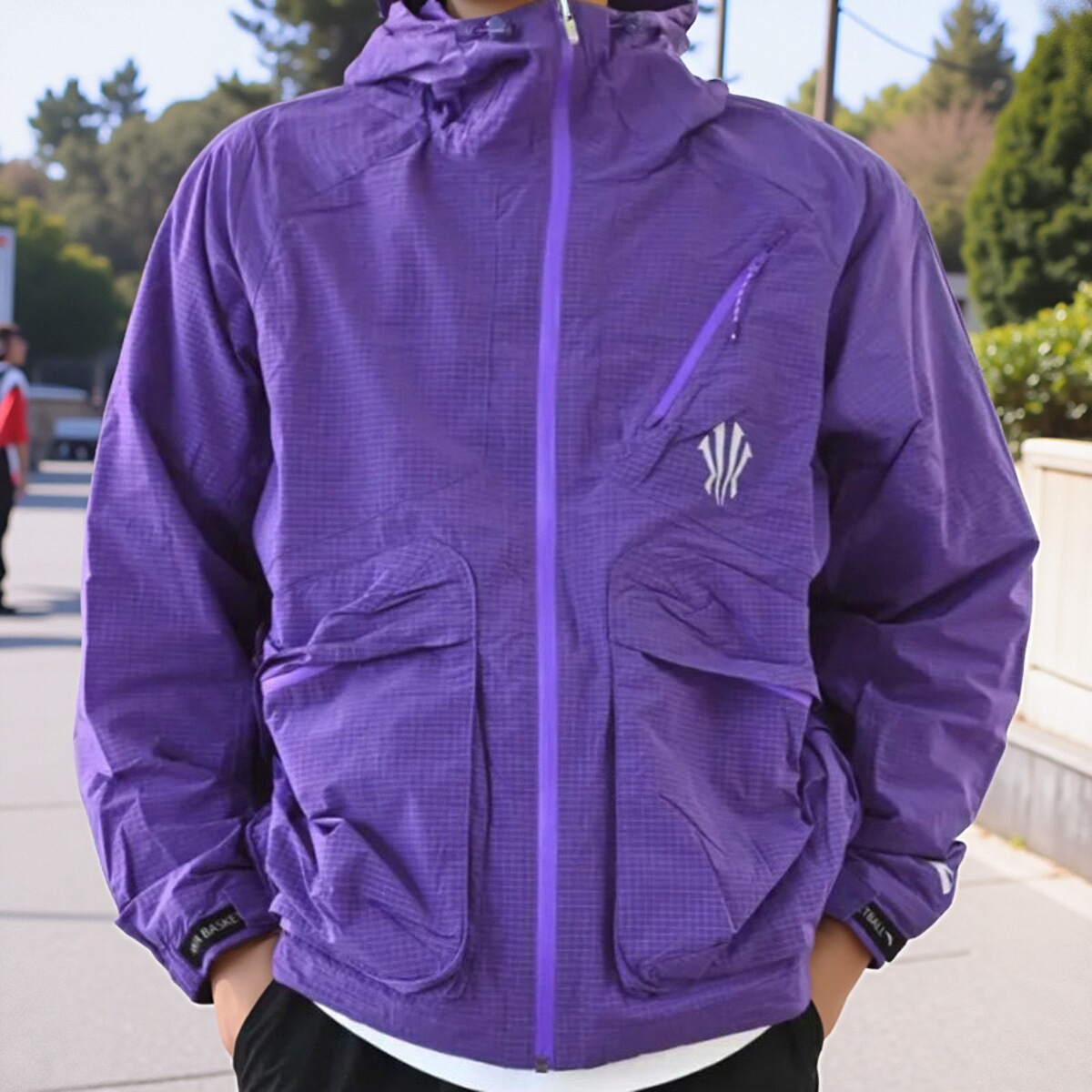 正品安踏欧文防泼水宽松梭织外套