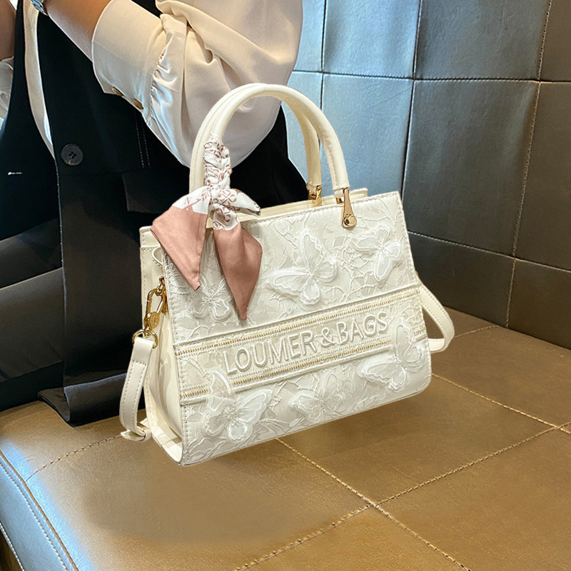 轻奢蝴蝶刺绣包包2026新款大容量托特包小个子通勤手提单肩斜挎包