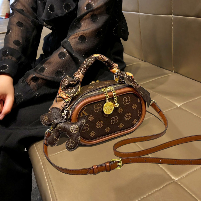 包包2026新款高级感时尚百搭印花相机小圆包女手提单肩斜挎包