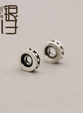 S925纯银光边波点花纹小孔隔珠