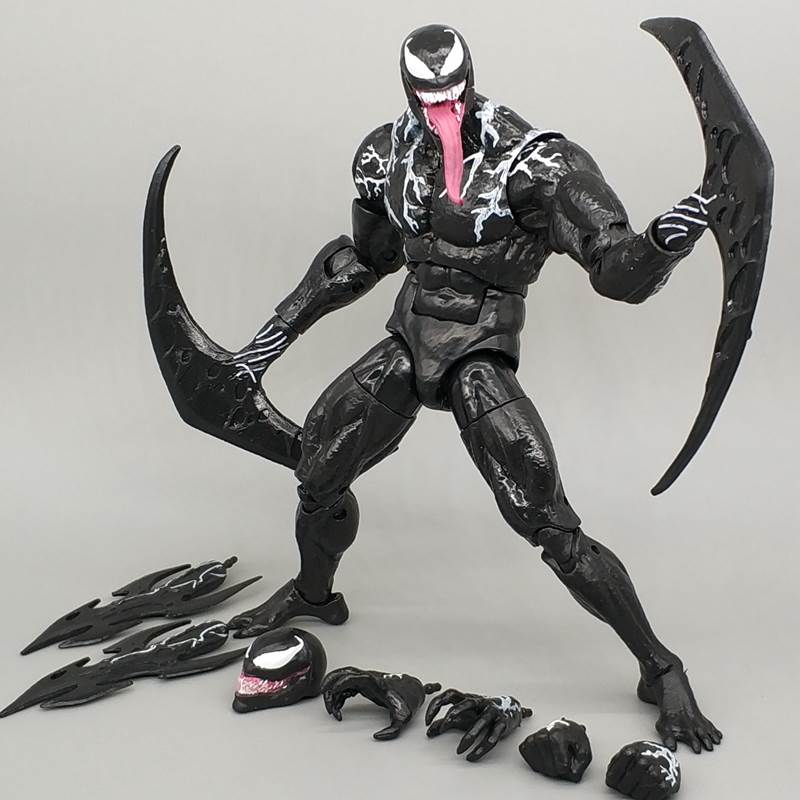 。 Toy venom hand slaughtering actuation model spider doll man life Guardian boy car accessories can be the same