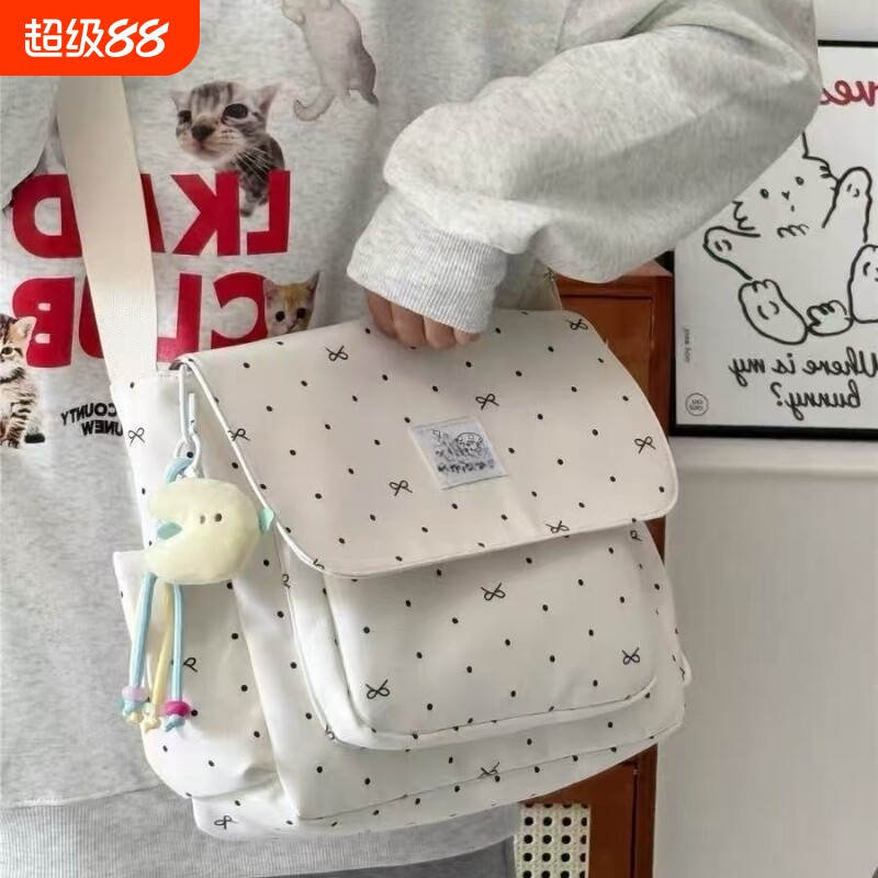 少女学生大容量学生上课百搭纯色斜挎包日系ins邮差包碎花布包