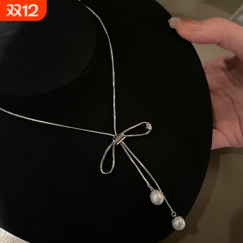 诸暨淡水珍珠吊坠女miu系少女心蝴蝶结毛衣链礼物送妈妈闺蜜水滴