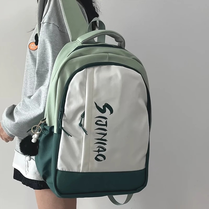 大容量学生书包拼色初中高中生印花双肩包轻便旅行包