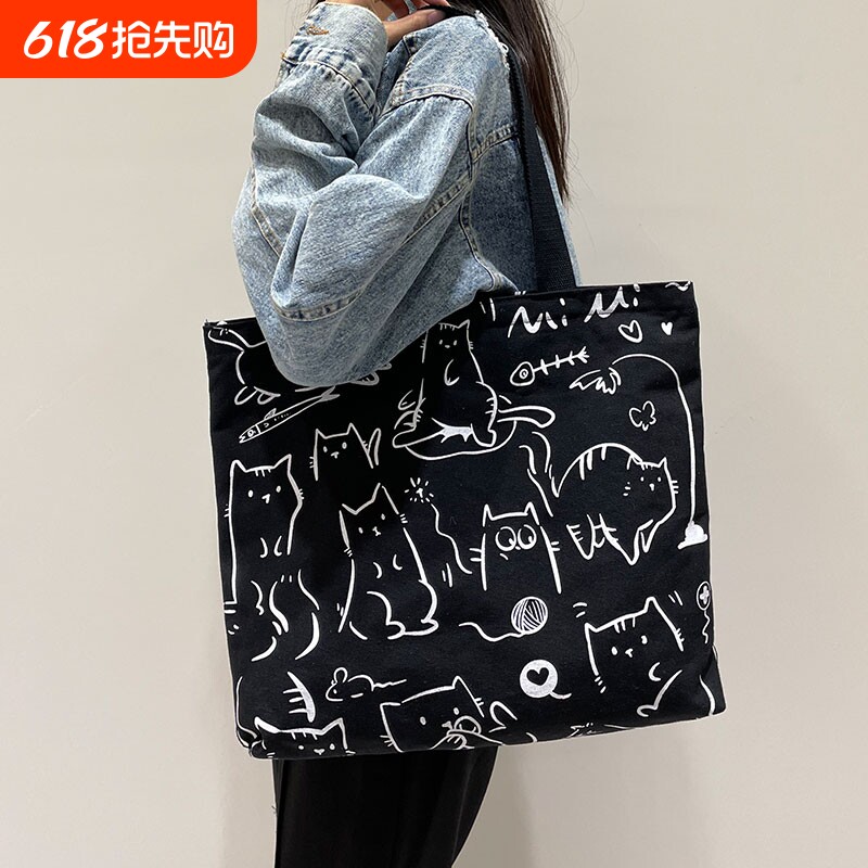 帆布包女2024年大容量通勤手提袋学生单肩包上班挎包黑色时尚可爱