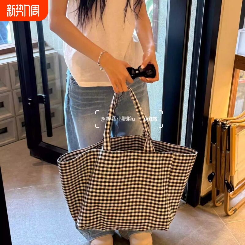 韩版慵懒感通勤大托特包黑白格单肩收纳购物袋帆布2025新款大容量