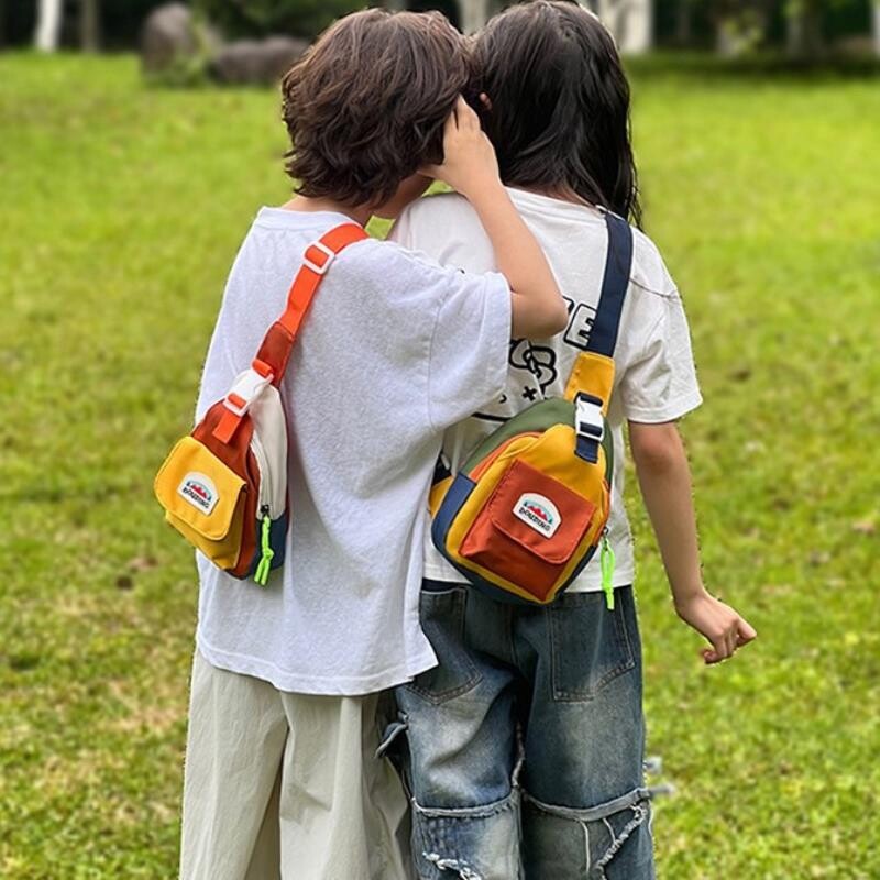 新款时尚儿童男童女童胸包潮酷拼色轻便出游迷你小包包手机斜挎包