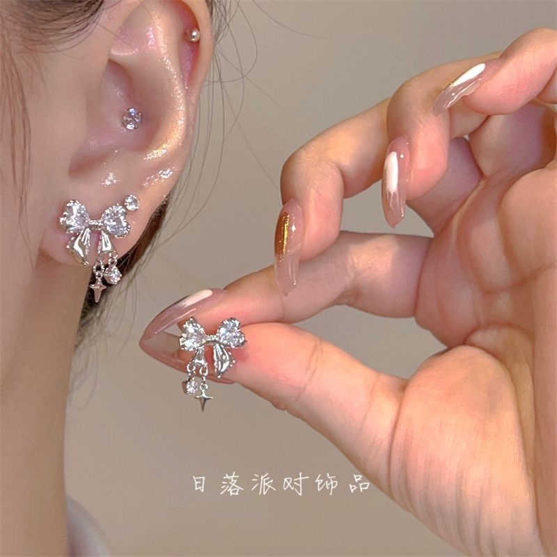 星芒蝴蝶结锆石耳夹女小众耳饰气质百搭无耳洞蚊香盘不对称精灵