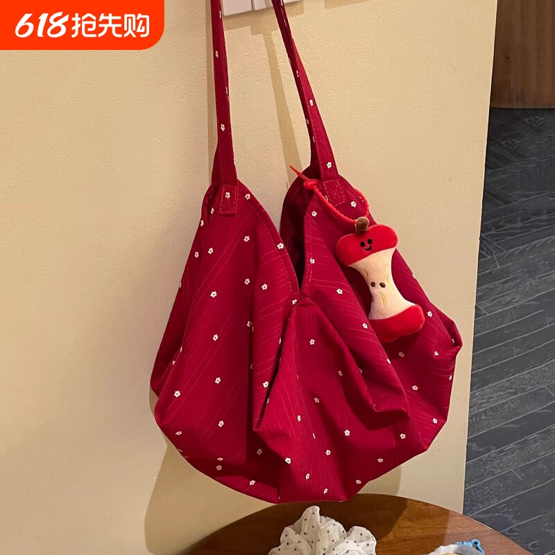 红色帆布包包女2025新款韩系慵懒风日常通勤百搭单肩大容量托特包