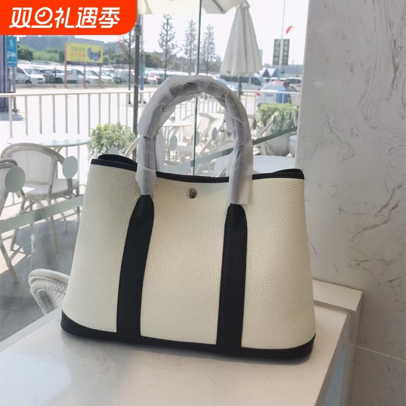 新款包包欧美流行款女包花园包帆布肩带手提单肩头层牛皮女包