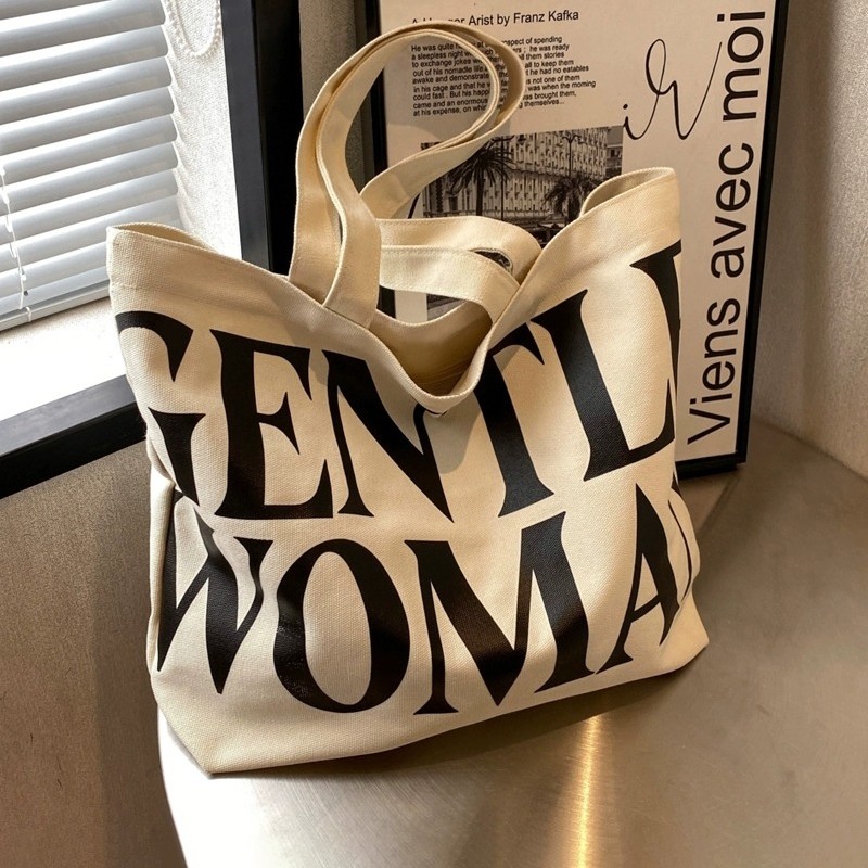 大容量字母帆布包包女新款时尚单肩托特包外出手提购物袋拉链立体