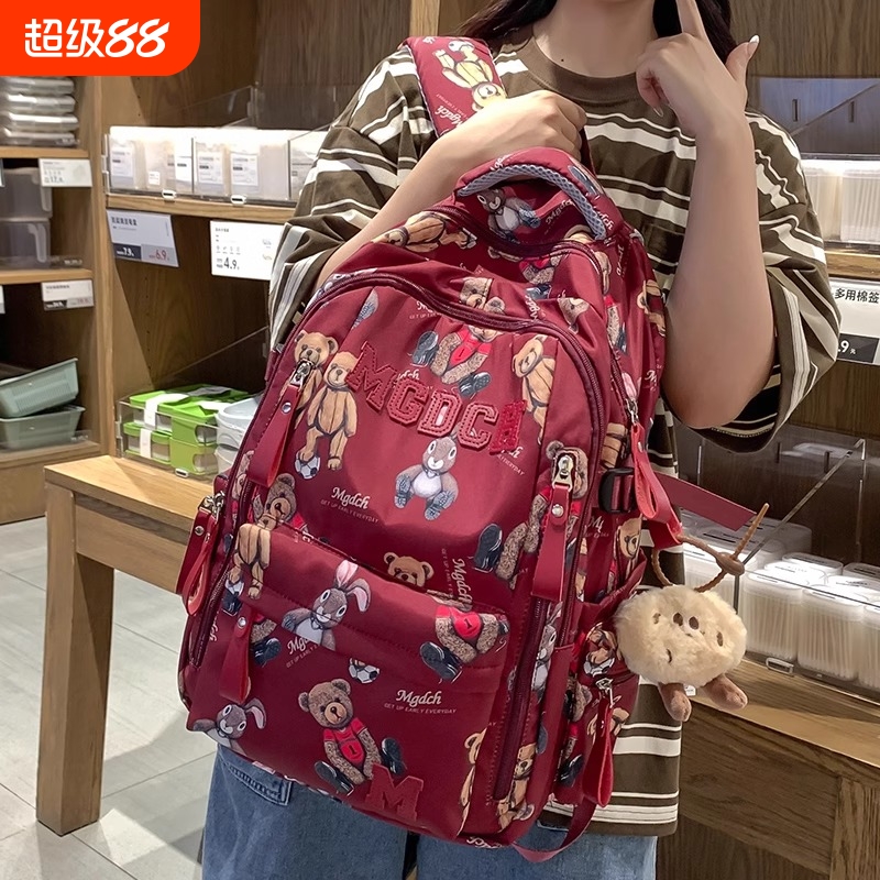 轻便大容量书包初高中大学生护脊减负双肩背包旅行包