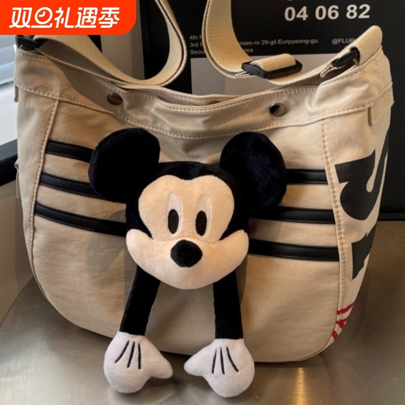 大容量尼龙包包女2025新款通勤单肩饺子包可爱学生上课斜挎包轻便