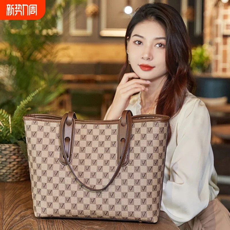 真皮女包通勤2026新款时尚简约新款大容量高级单肩手提包托特包潮