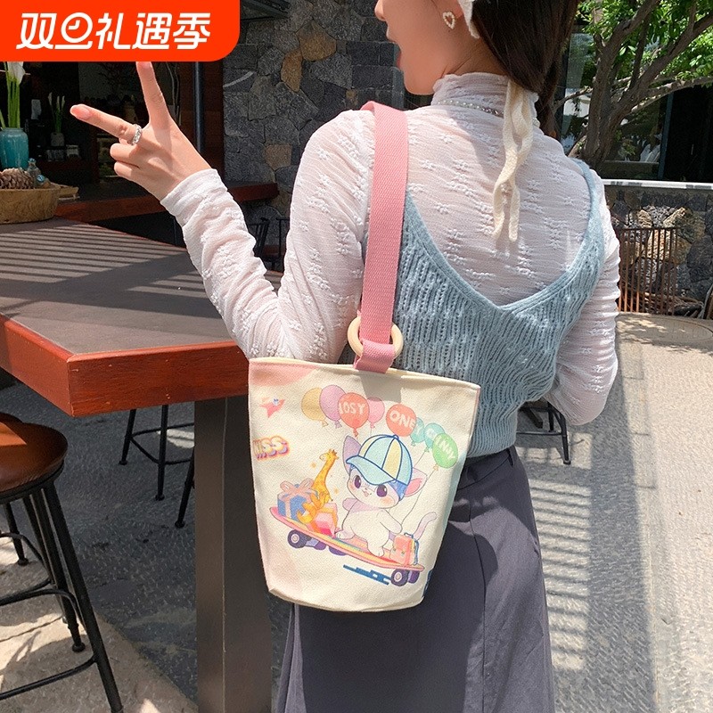 帆布包女厂家批发大容量手提袋子水桶包2025新款饭盒便当包手拎