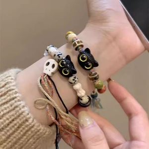骷髅猫咪编织绳手链女小众设计感甜酷中国风流彩色仿陶瓷手串手饰