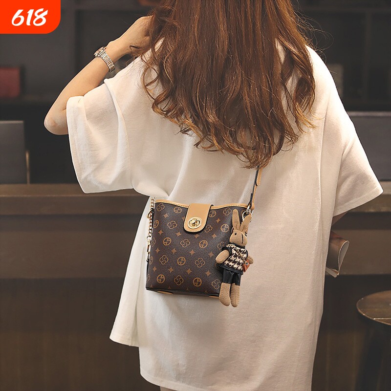 店酷奇水桶包包女式2026新款斜挎包女包bags妈妈包高级感单肩出门