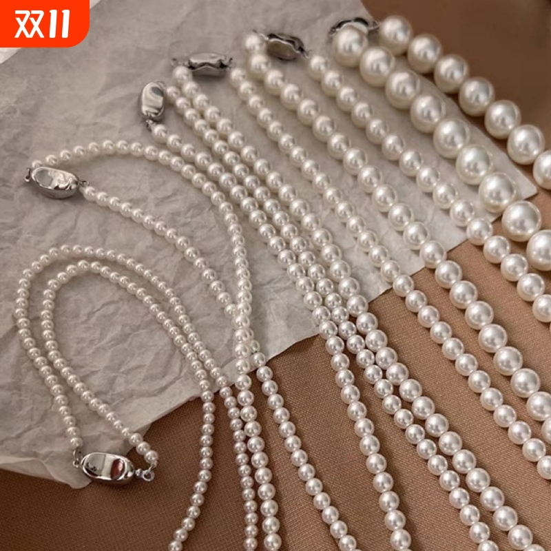 施家珍珠项链女气质轻奢设计高级感小众锁骨链毛衣链十字架不掉色