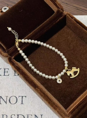 “马上有钱”环扣金色小马黑色抽拉编织手绳女小众设计精致手链