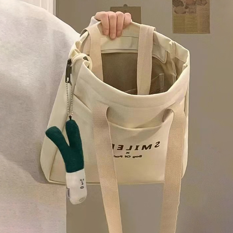 学生大学生上课帆布包女2024新款大容量休闲百搭手提通勤托特