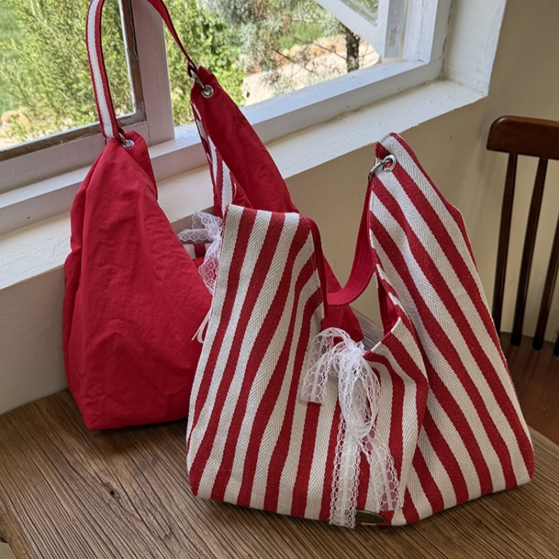 条纹帆布包包女夏天2025新款潮韩国字母印花双面单肩包学生上课包