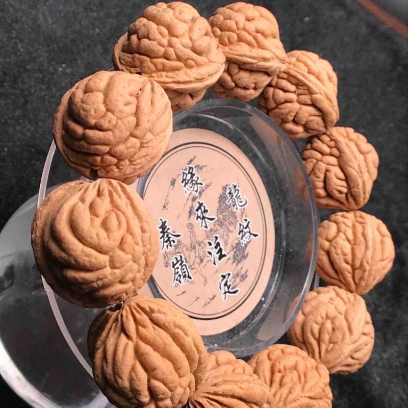 秦岭野外生霸王龙桃核手把件佛珠